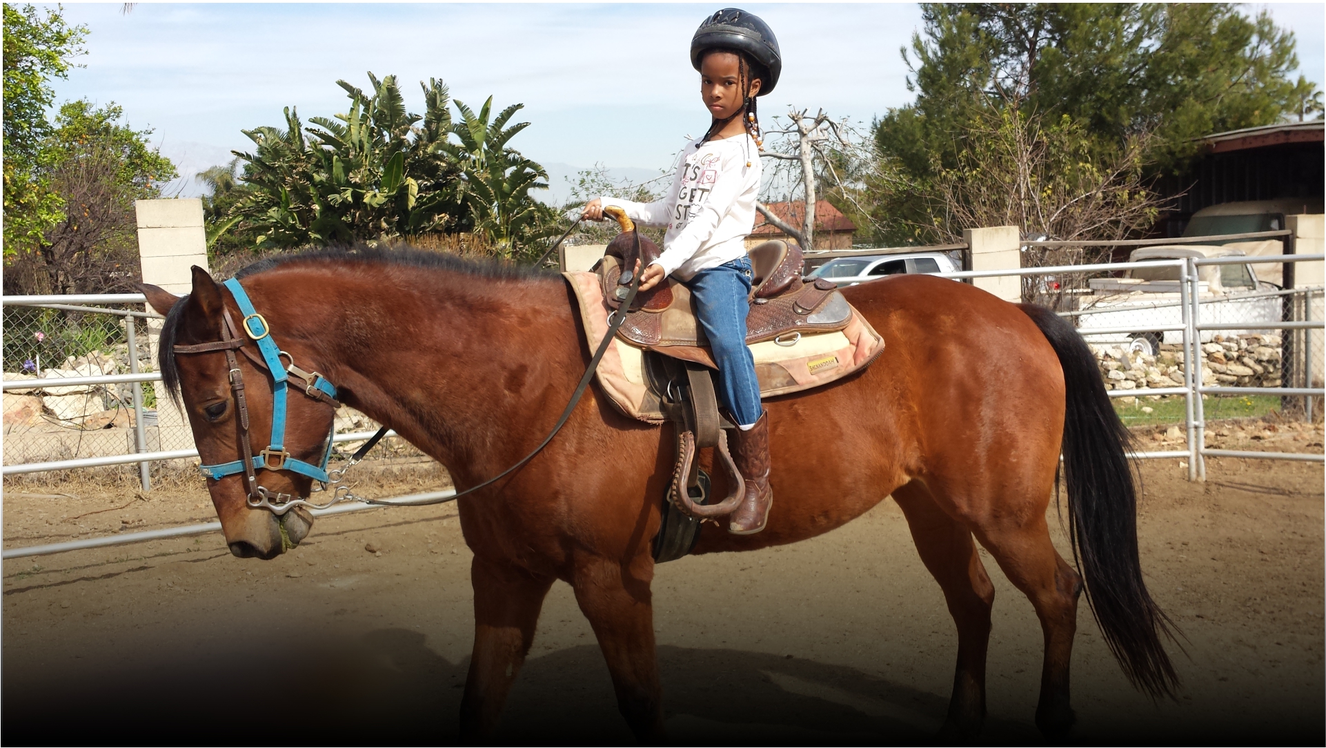 child Riding horse